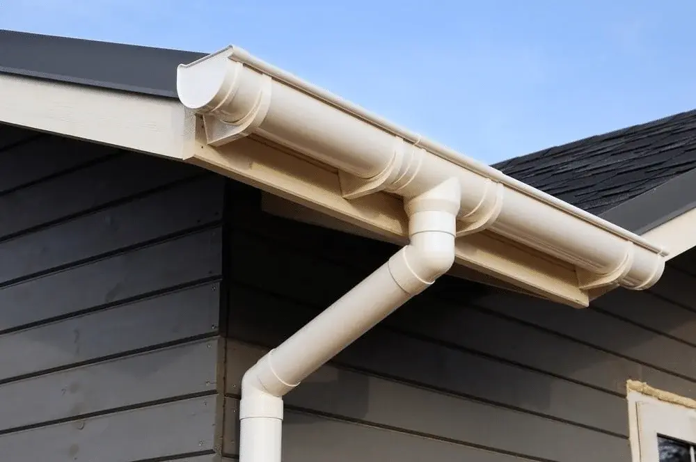 White guttering and downpipe fitted to a Mansfield property